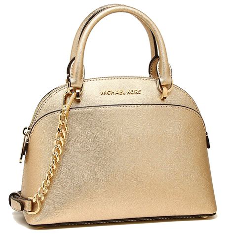 Michael Kors gold leather handbags